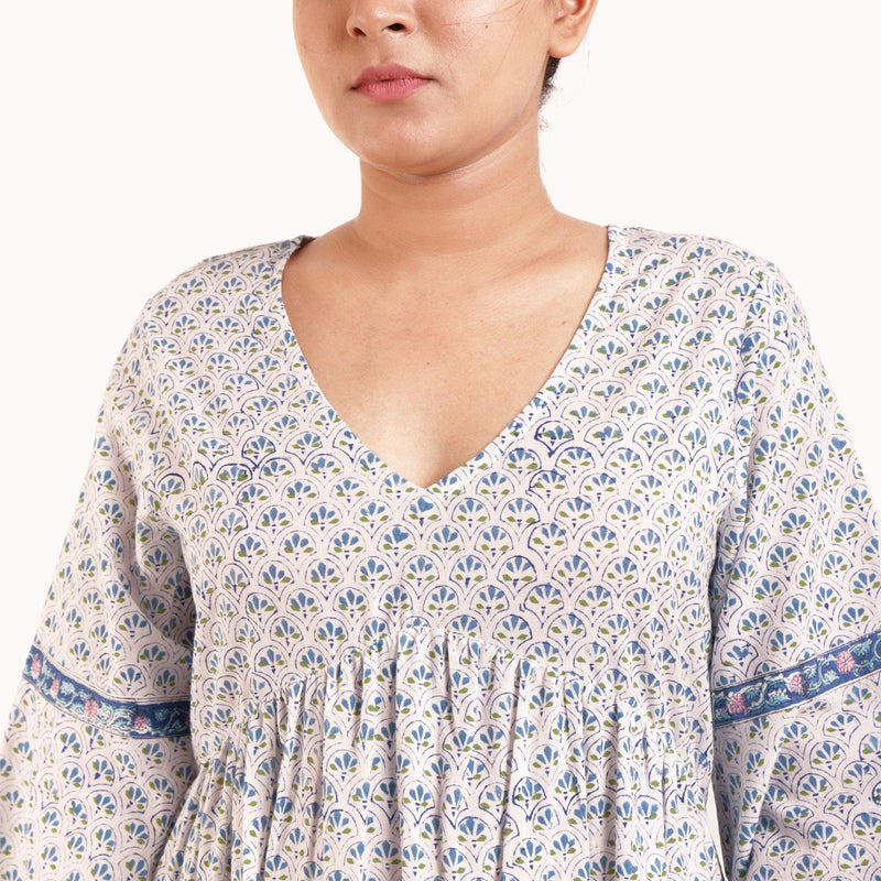 Front Detail of a Model wearing Blue Block Printed Bell Sleeves Tier Dress