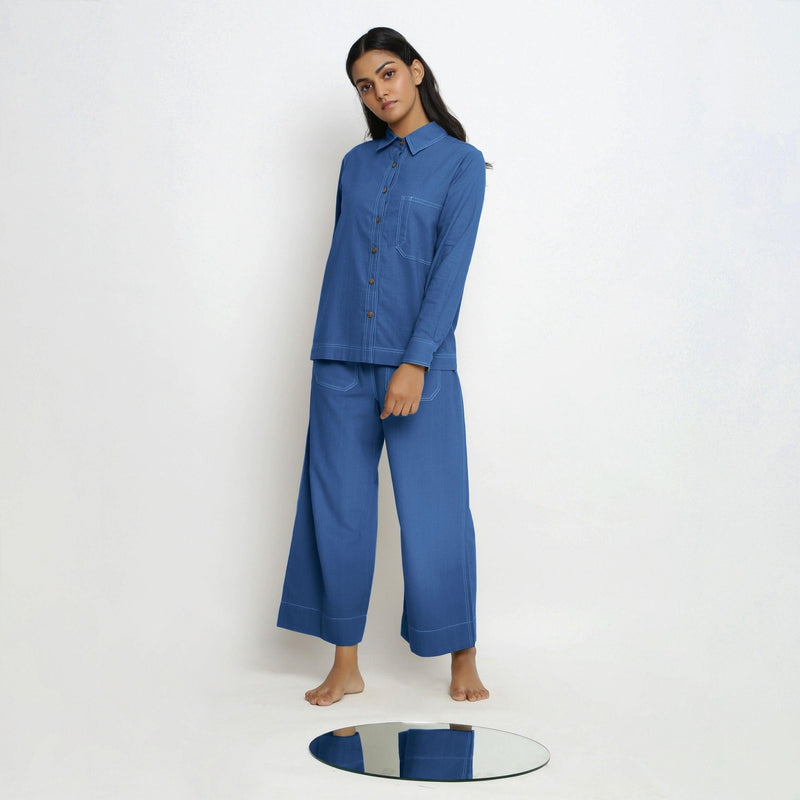 Front View of a Model wearing Blue Button-Down Top and Powder Blue Pant Set