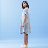 Left View of a Model wearing Indigo Dabu Print Cotton A-Line Dress