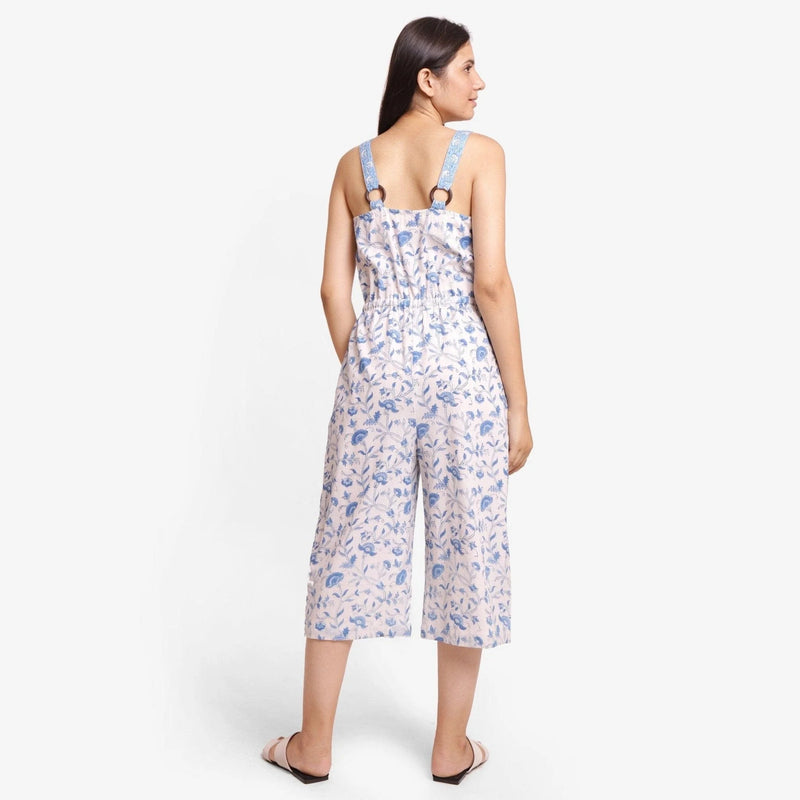 Back View of a Model wearing Blue Floral Button-Down Midi Jumpsuit