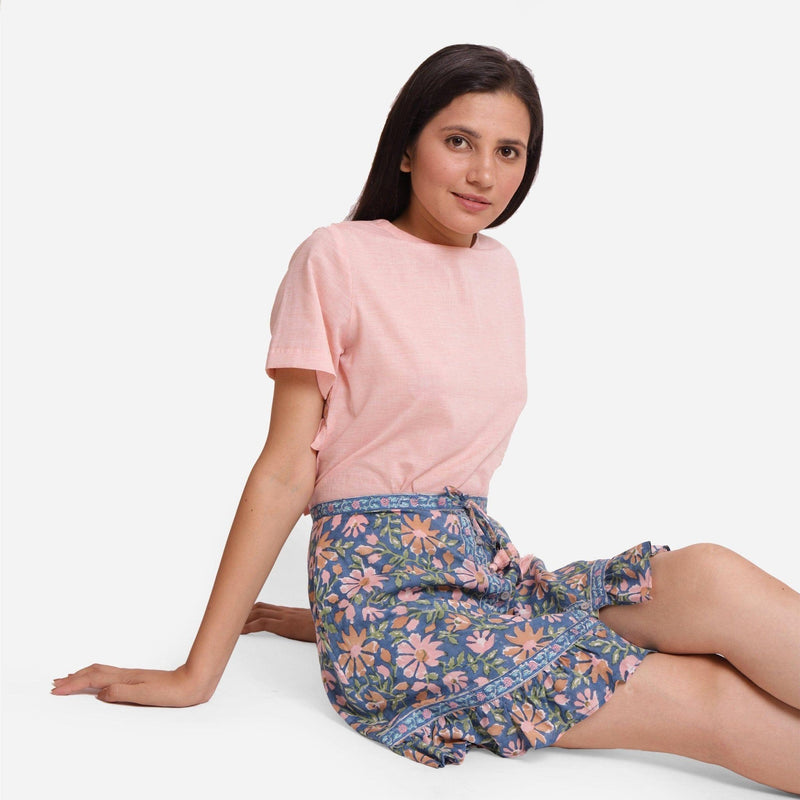 Right View of a Model wearing Blue Cotton Floral Button-Down Skirt