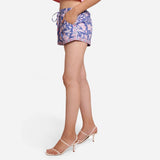 Left View of a Model wearing Blue Sanganeri Print Floral Short Shorts