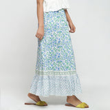 Right View of a Model wearing Blue Printed Flowy Paneled Skirt