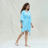 Right View of a Model wearing Blue Hand Tie-Dye Cotton Short Kaftan Dress