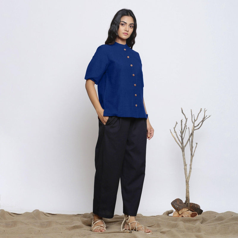 Right View of a Model wearing Blue Handspun Cotton Button-Down Top