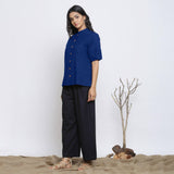 Left View of a Model wearing Blue Handspun Cotton Button-Down Top