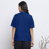 Back View of a Model wearing Blue Handspun Cotton Button-Down Top