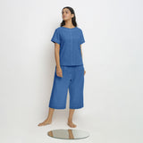 Front View of a Model wearing Blue Paneled Top and Mid-Rise Culottes Set