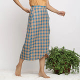 Right View of a Model wearing Bottle Green Handspun Wrap Maxi Skirt