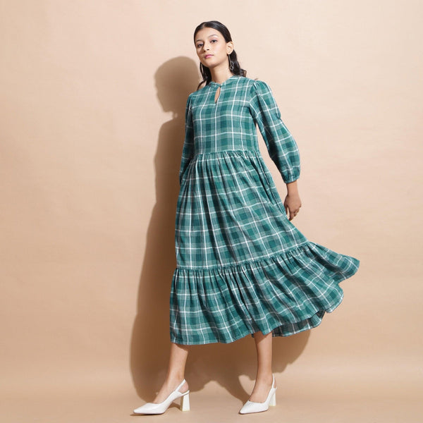 Front View of a Model wearing Bottle Green Puff Sleeves Gathered Dress