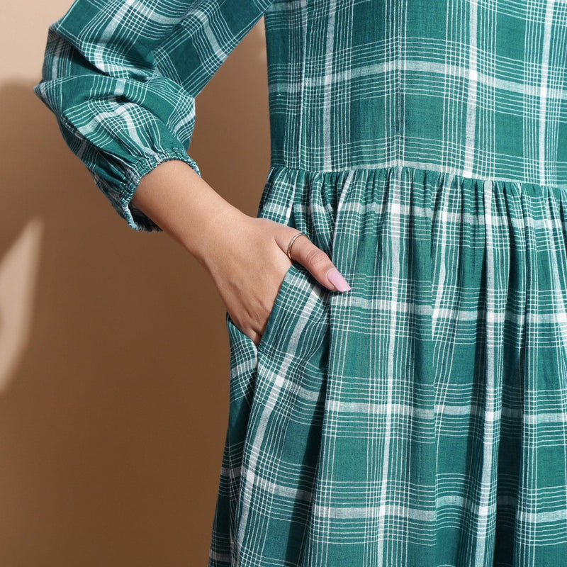 Front Detail of a Model wearing Bottle Green Puff Sleeves Gathered Dress