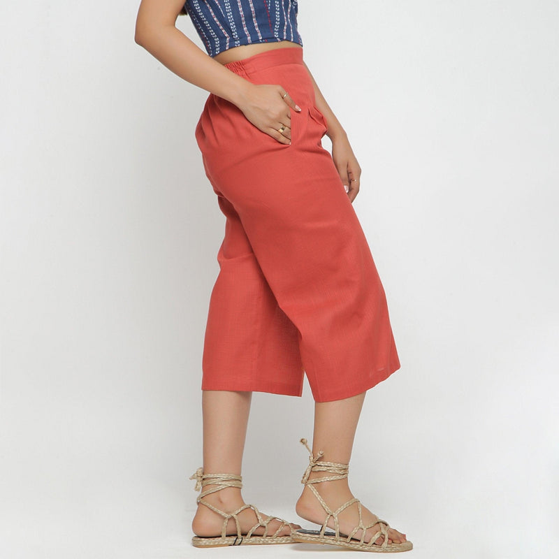 Right View of a Model wearing Brick Red Cotton High Rise Culottes