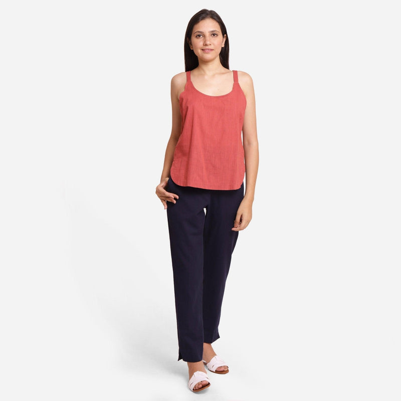 Front View of a Model wearing Brick Red Cotton Spaghetti Strap Top