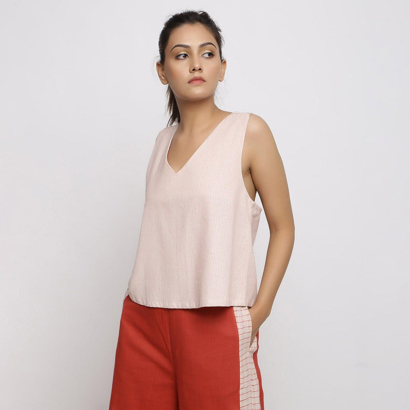 Front View of a Model wearing Vegetable Dyed Pink Deep Neck Top