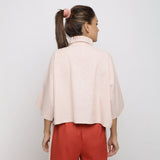 Back View of a Model wearing Pink Handspun Vegetable Dyed Crop Top