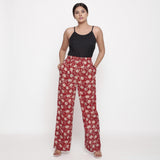 Front View of a Model wearing Brick Red Block Print Wide Legged Pant