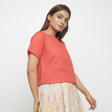 Right View of a Model wearing Brick Red Boat Neck Half Sleeve Cotton Top