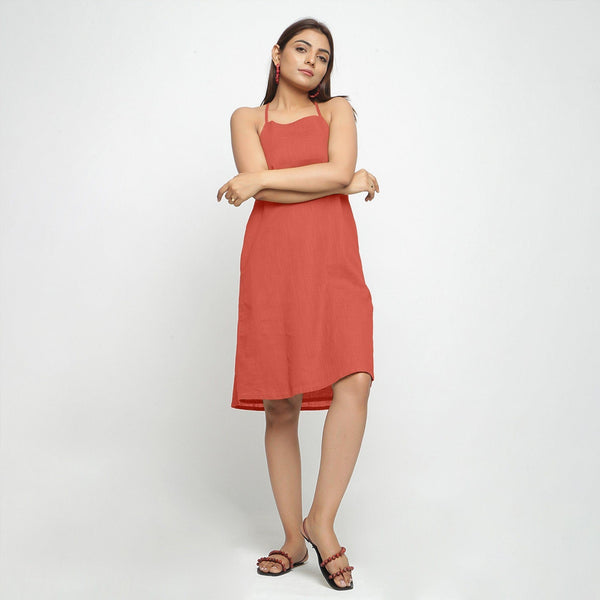 Front View of a Model wearing Brick Red Criss-Cross Cotton A-Line Dress