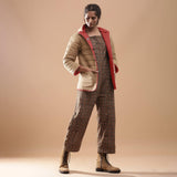 Right View of a Model wearing Brick Red Reversible Detachable Hoodie Quilted Cotton Jacket