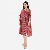 Left View of a Model wearing Brick Red Bagru Printed V-Neck Kaftan