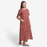 Front View of a Model wearing Brick Red Block Printed Maxi Dress