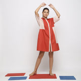 Front View of a Model wearing Brick Red Vegetable Dyed Cotton Button-Down Knee-Length Dress