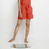 Front View of a Model wearing Brick Red Vegetable Dyed Handspun Short Shorts