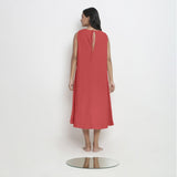 Back View of a Model wearing Brick Red Vegetable Dyed A-Line Paneled Dress