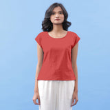 Front View of a Model wearing Brick Red Vegetable Dyed Handspun Cotton Essential Top