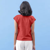 Back View of a Model wearing Brick Red Vegetable Dyed Handspun Cotton Essential Top