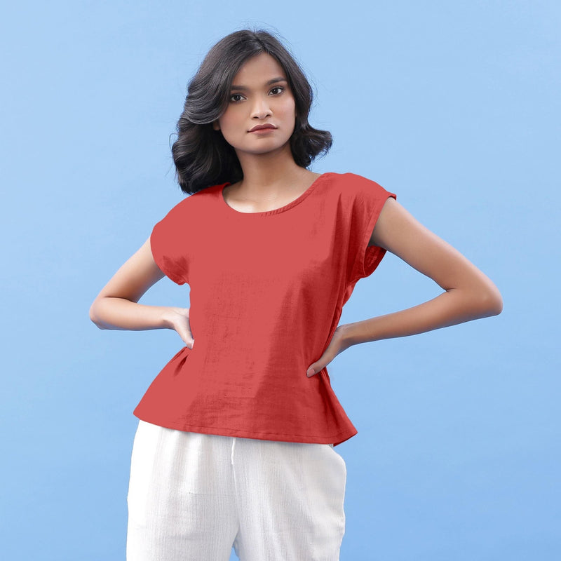 Front View of a Model wearing Brick Red Vegetable Dyed Handspun Cotton Essential Top