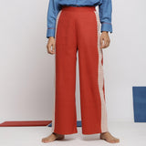 Front View of a Model wearing Brick Red Vegetable Dyed Handspun Cotton Wide Legged Pant