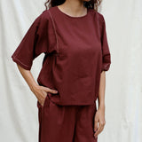 Front Detail of a Model wearing Brown 100% Cotton Drop Shoulder Sleeves Gathered Top