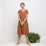 Front View of a Model wearing Brown Handspun V-Neck Shift Dress