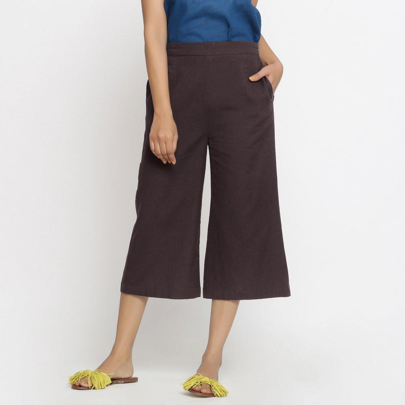 Front View of a Model wearing Brown Mid-Rise Cotton Flax Culottes