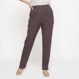 Front View of a Model wearing Cotton Flax Mid-Rise Brown Tapered Pant