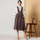 Front View of a Model wearing Brown Cotton Flax Pinafore Midi Wrap Dress