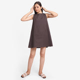 Front View Of a Model wearing Brown Cotton Flax Kangaroo Pocket Dress