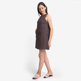 Left View Of a Model wearing Brown Cotton Flax Kangaroo Pocket Dress