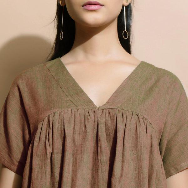 Front Detail of a Model wearing Handspun Brown Drop Shoulder Yoke Dress