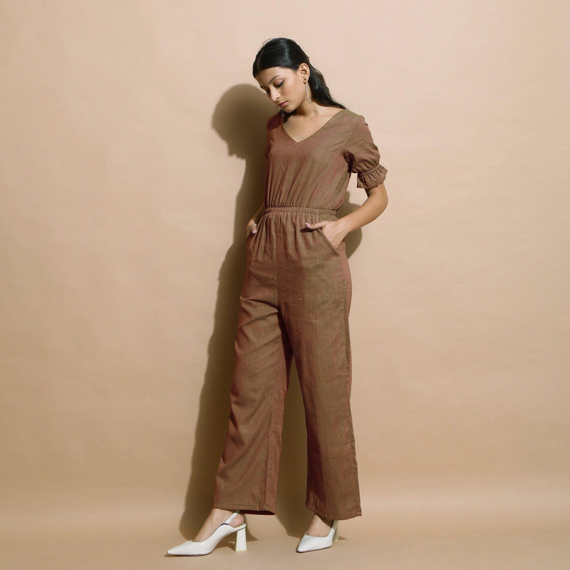 Left View of a Model wearing Handspun Frilled Sleeve Straight Jumpsuit