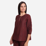 Left View of a Model wearing Brown Mangalgiri Cotton Tunic Top