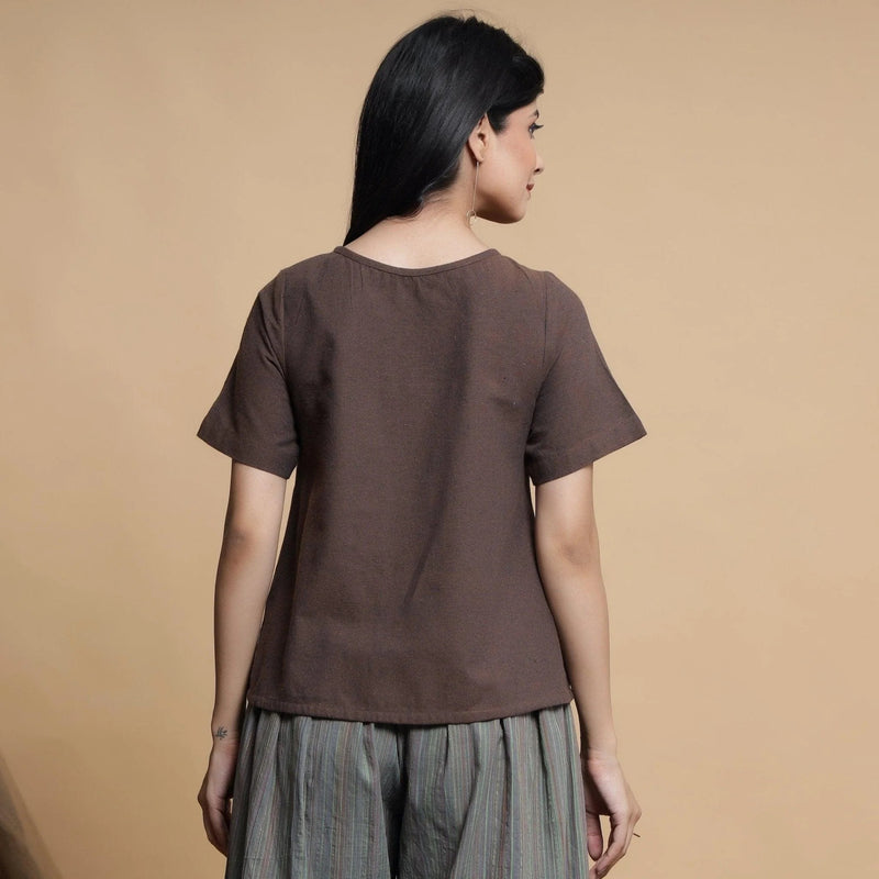 Back View of a Model wearing Brown Pleated Neck A-Line Top