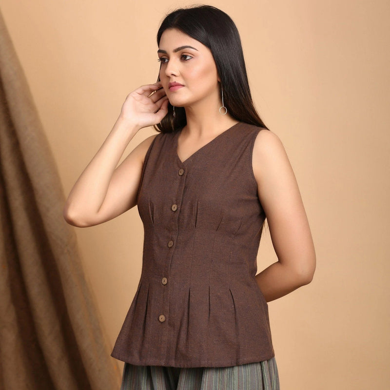 Left View of a Model wearing Brown Button Down Pleated Top