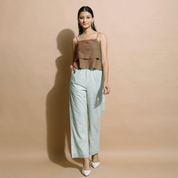 Front View of a Model wearing Brown Handspun Flared Camisole Top