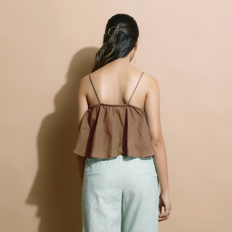 Back View of a Model wearing Brown Handspun Flared Camisole Top