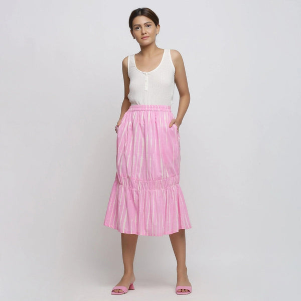 Front View of a Model wearing Bubblegum Pink Tie-Dye Cotton Elasticated Midi Balloon Skirt