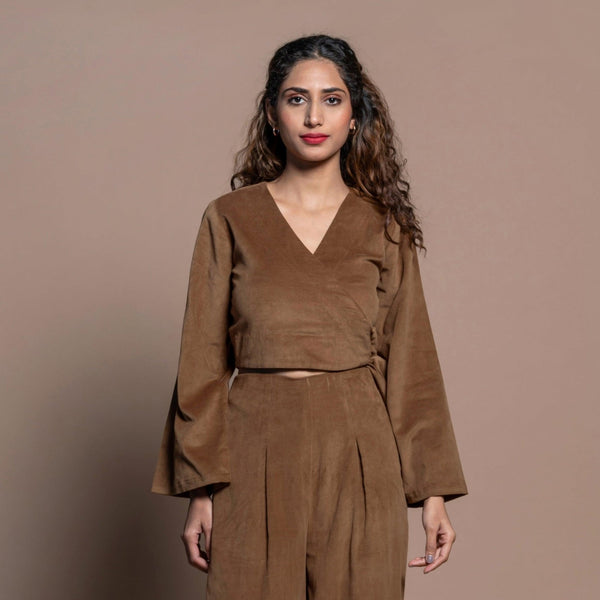 Front View of a Model wearing Camel Brown Cotton Velvet Full Sleeve Wrap Crop Top