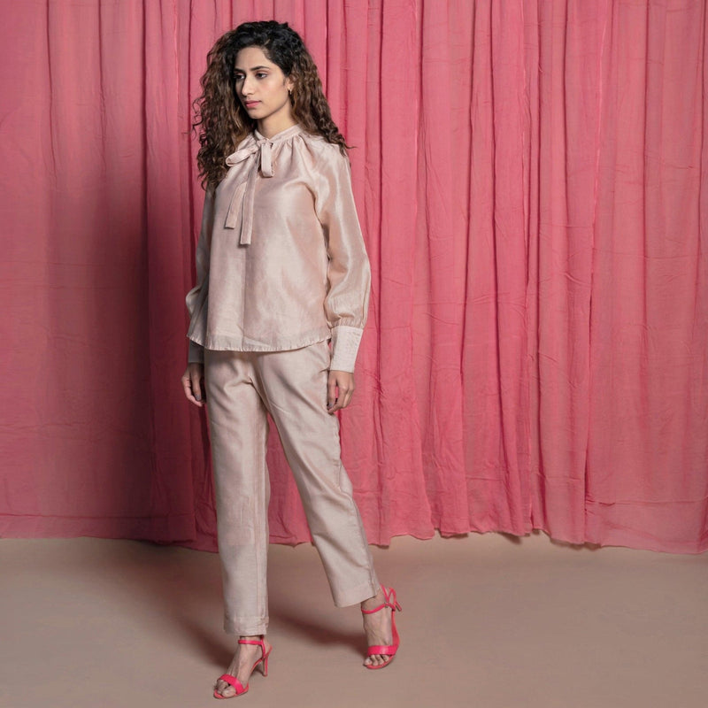 Left View of a Model wearing Champagne Chanderi Flared Top and Pant set