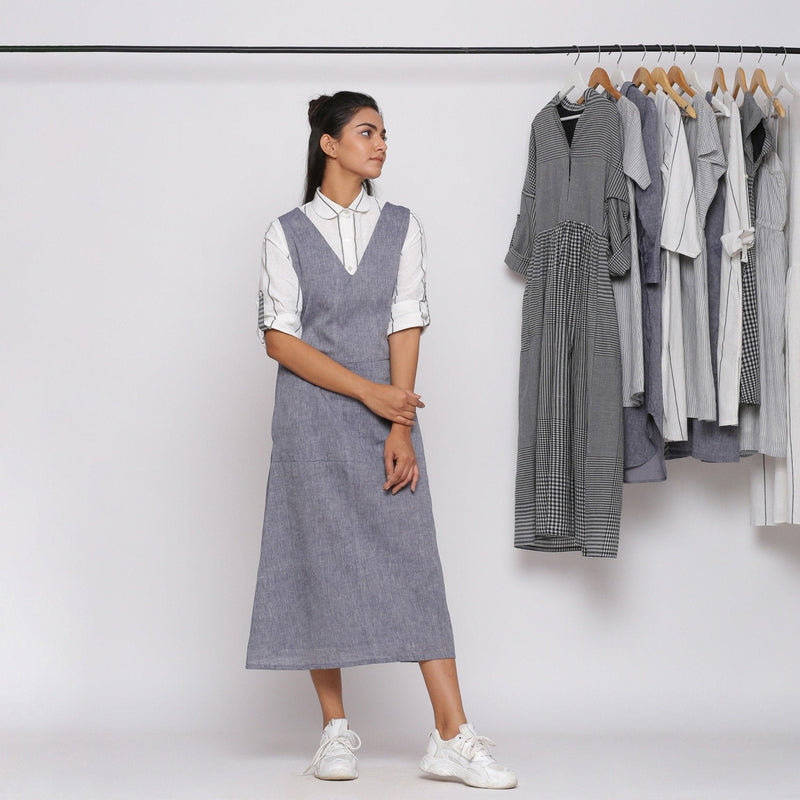 Front View of a Model wearing Deep V-Neck Charcoal Grey Pinafore Dress